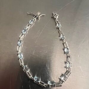 Sterling Silver & Light Blue Topaz Tennis Bracelet